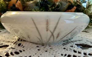 Vintage white porcelain serving bowl with grey and pink wheat stalk design.